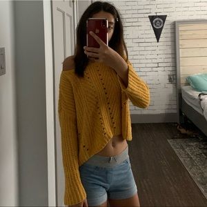 Super cute off the shoulder sweater.